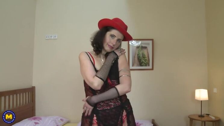 Mature brunette Darlena teases her hairy pussy solo